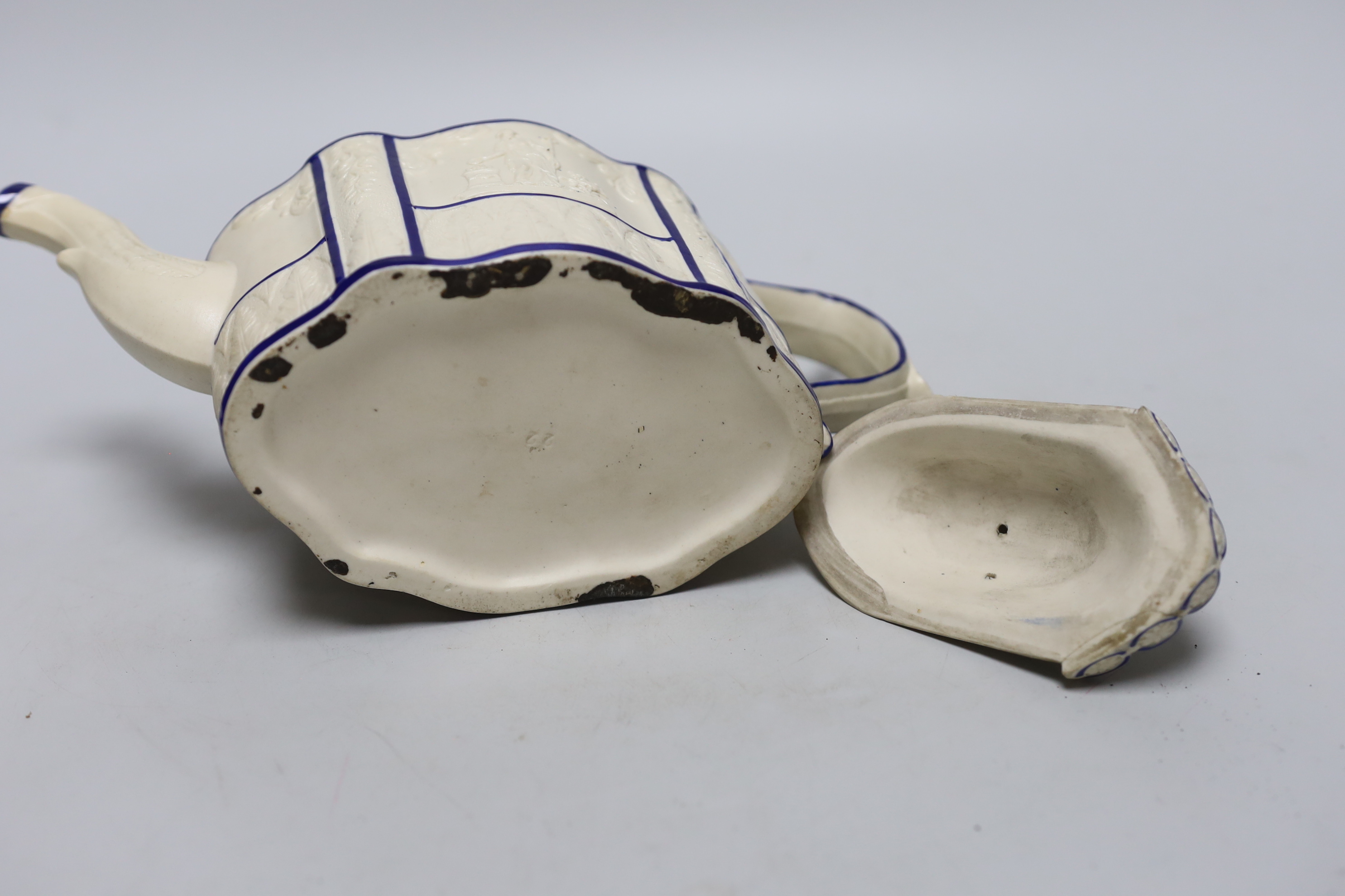 An early 19th century Castleford style feldspathic stoneware teapot with sliding lid cover, 16cm